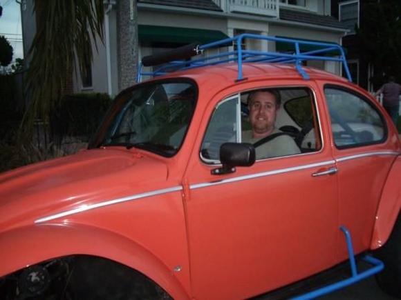 Me in my first car. 65 body on a 68 IRS chasis with full roll cage and 1776 motor with dual weber 40 carbs and beard racing seats.