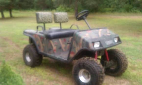 Dad lifted his golf cart....