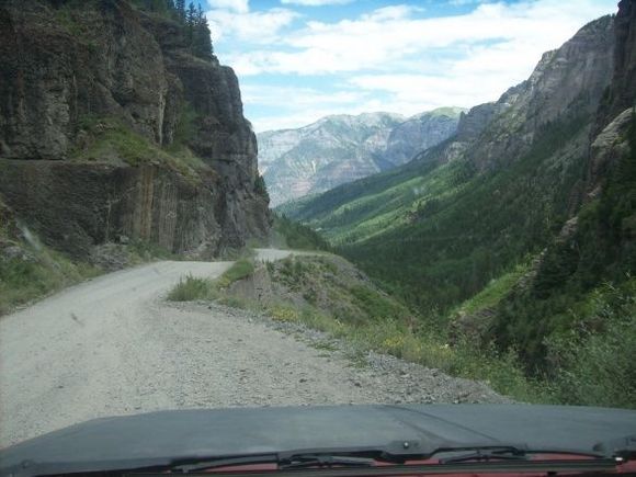 Camp Bird road heading towards Ouray just above the shelf area with the overhanging rocks.