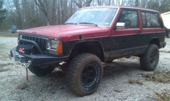Rough Country winch, bumper, bull bar &amp; D rings.  Also got the 32" tires on it.