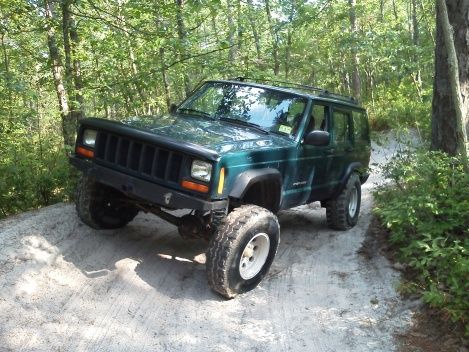 First trail ride after putting in lift, needs lockers and new tires!