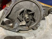 Old water pump , coolant side , note a touch of corrosion along the seal line , it was not long until a leak would have started
