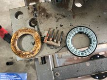 Old bearing for strut mounting plate on the left new one on the right 