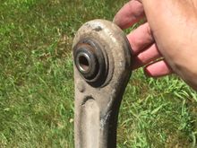 This is the top side, the bushing is pressed up and out, the new bushing presses in from this side, it has a taper or bevel to start it into the LCA, the hole has a slight bevel also to start the bushing in, I used a 1 7/8 socket and 8lb hammer to drive them home, using an old brake disc for an anvil.