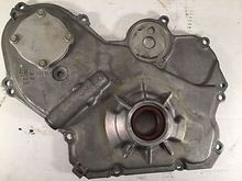 Seeing as the water pump bolt gets torqued to 18 ft/lbs and the serpentine belt tensioner bolt gets 37 ft/lbs, possibly just tightening the lower 5 or 6 cover bolts will cure the problem 