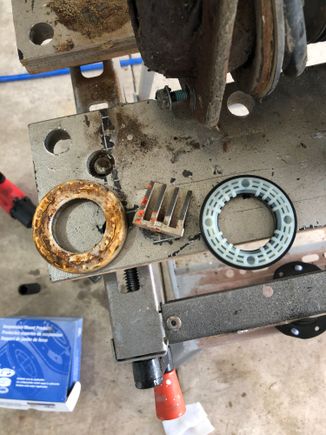 Old bearing for strut mounting plate on the left new one on the right 