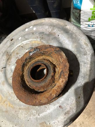 This is the top side where the plastic bearing lives , sandwiched in under the upper strut mount.