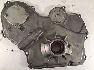 Seeing as the water pump bolt gets torqued to 18 ft/lbs and the serpentine belt tensioner bolt gets 37 ft/lbs, possibly just tightening the lower 5 or 6 cover bolts will cure the problem 