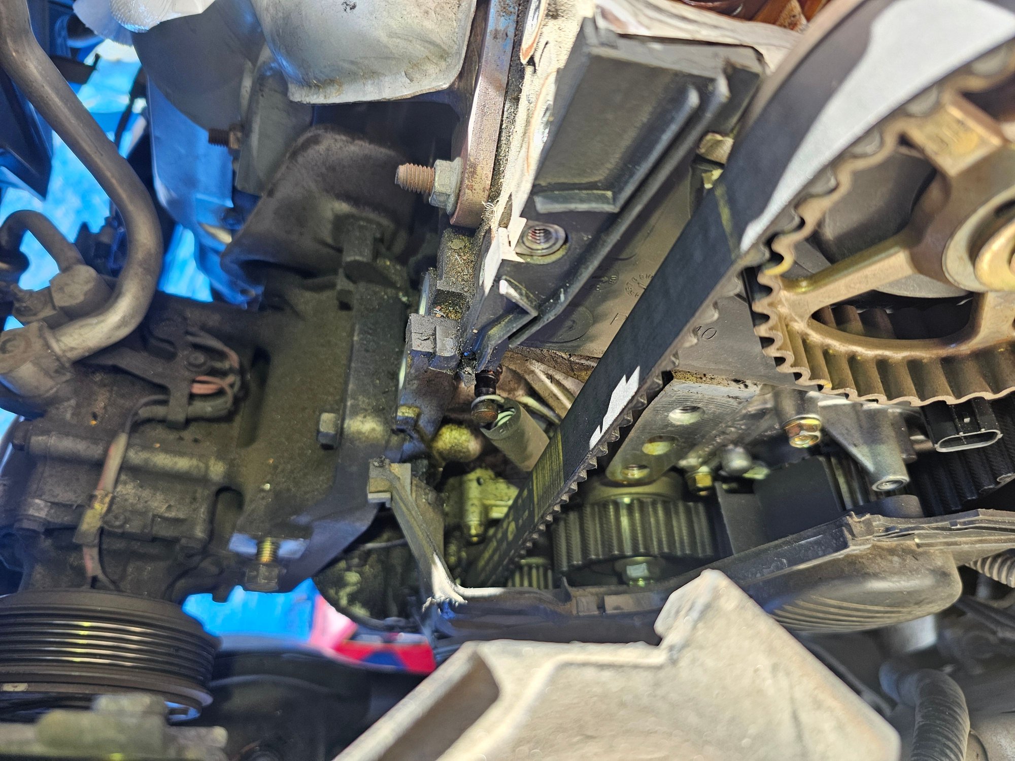 #1. Picture of head with some oil around the engine head area.