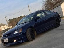 IMG 0989. Finished we added body kit and spoiler on trunk went back to OEM hood and trunk. Fog lights were really nice addition waiting on new wheels got tires.im the fixer my son is owner I got this car in 2016 June. Under 2600.00 but she's worth more now.