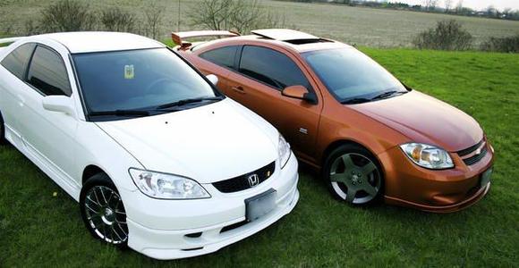 my civic with new rims and my buddy's supercharged cobalt ss