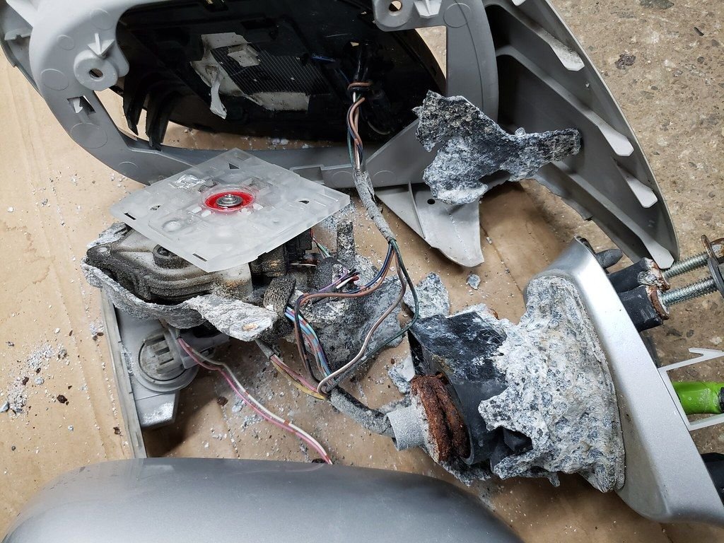 Corroded Side Mirrors Pushing Out & Cracking Plastic Housing