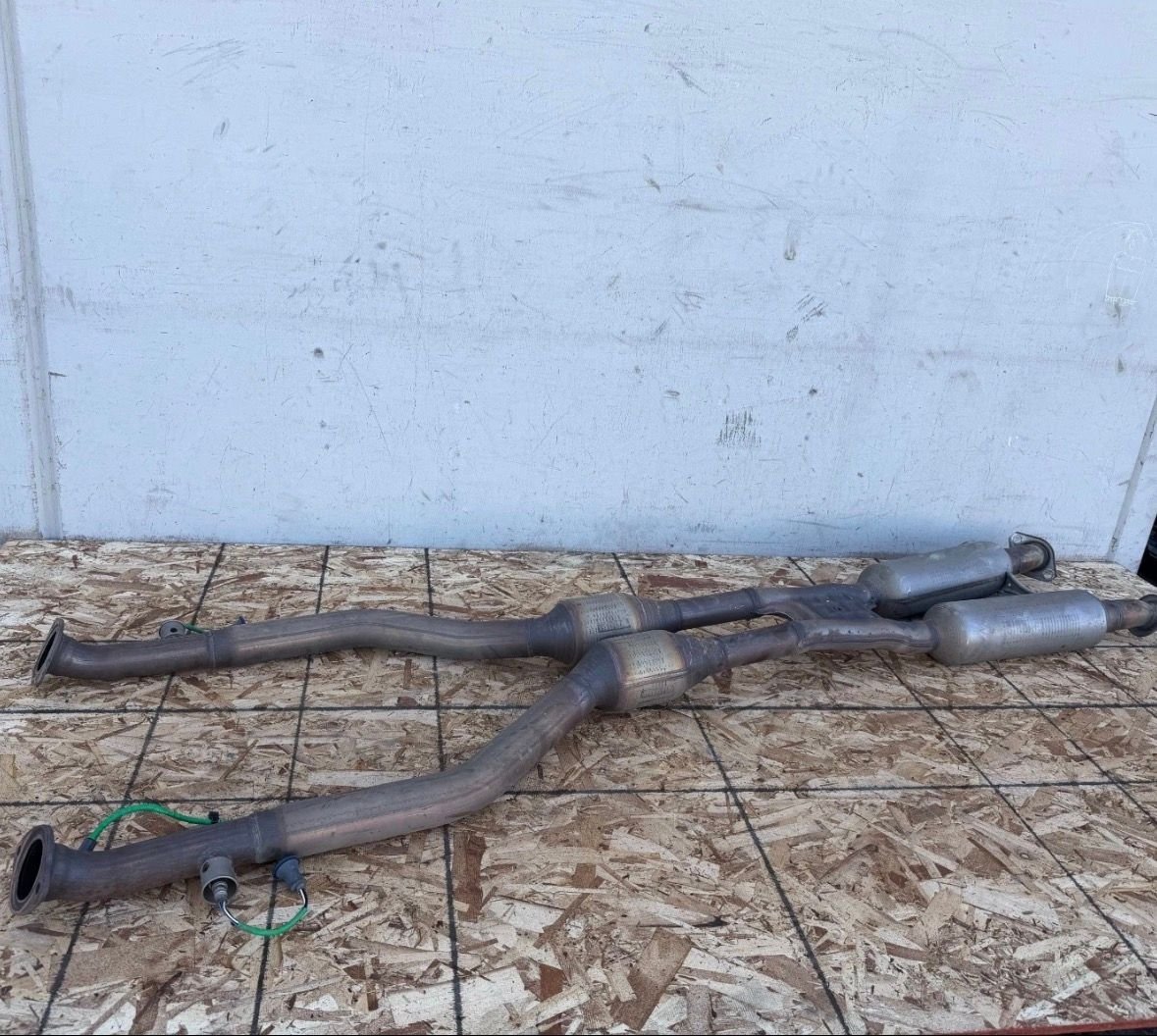 OEM midpipe section (EBay listing)