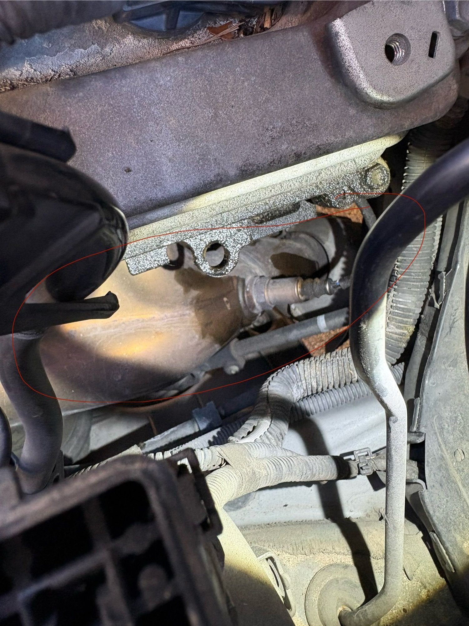 See drip stains falling on manifold, but from where?