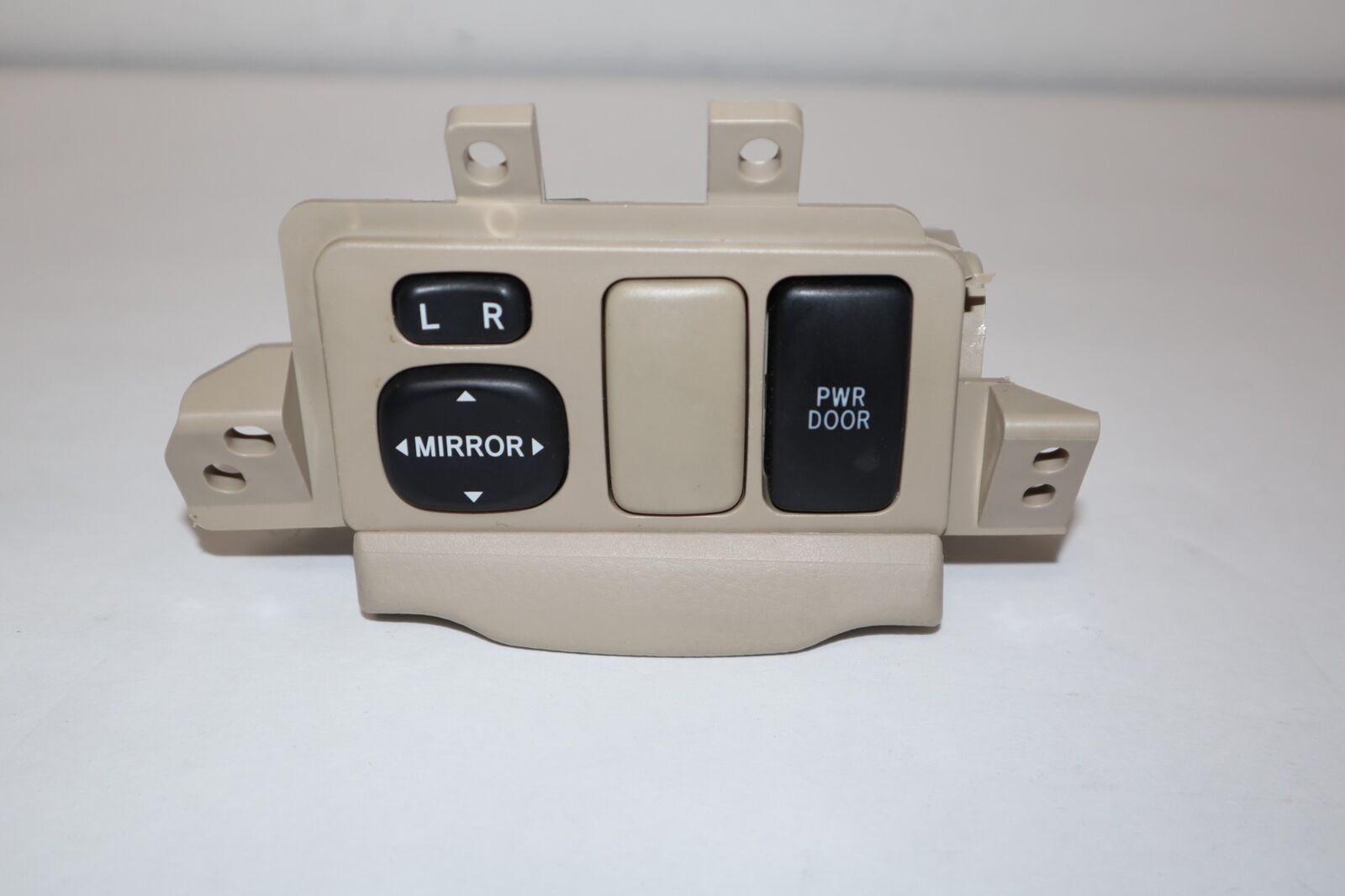 How to disable side mirror tilting down when the 2007 RX350 is put in