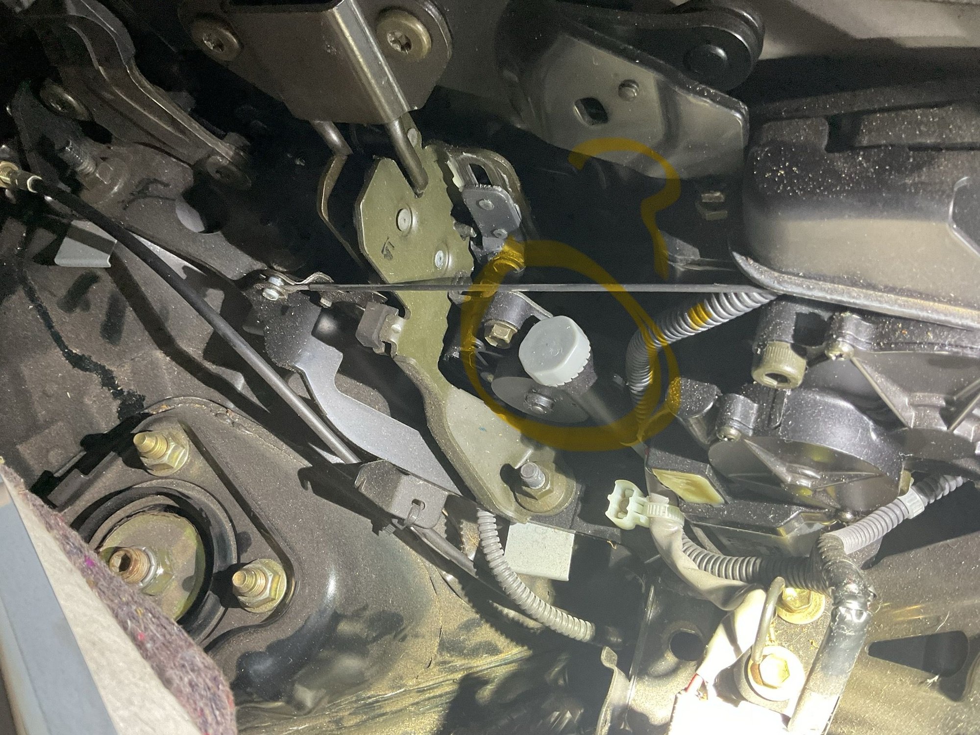 Circled in yellow. Can anyone tell me what this particular thing adjust or does. Thank you very much.