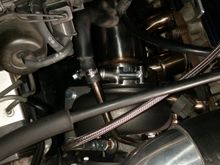 In this picture you can can get an idea of where the bolt is that needed to be modified to get the turbo bolted down onto the manifold.