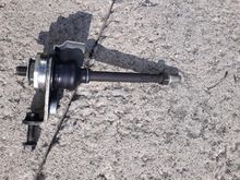 Right side inner tie rod assembly from 1994 LS400 featuring mounting bracket for steering damper. Should be plug and play on 1999 LS400. 