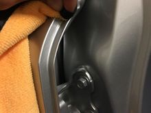 Before actually installing the trim piece, clean the channel out with some alcohol. Do this multiple times to rid of any grease or wax.