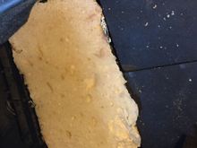After it hardened sawed off to make even.