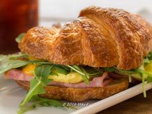 Black forest ham, egg and croissant sandwich