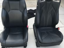Both passenger seats, side by side