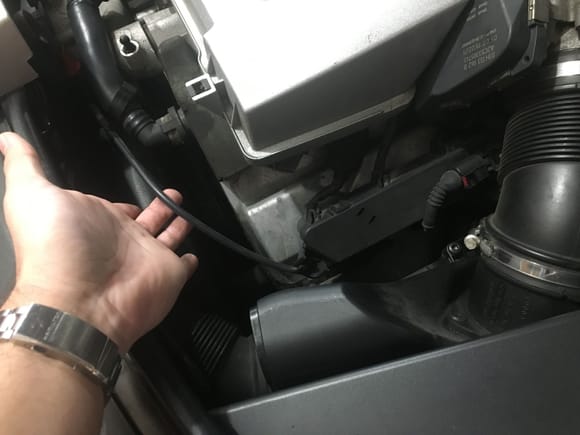 The drivers side head top conduit has only one sense lead and you can unplug it easily from the 4th engine temp sensor before flipping this side up and away 