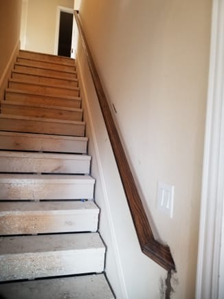 ^Stair rail is stained.