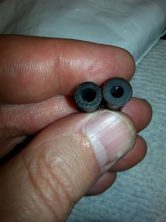 Old part on left with enlarged hole.  P.N. is visible, but none on new part....