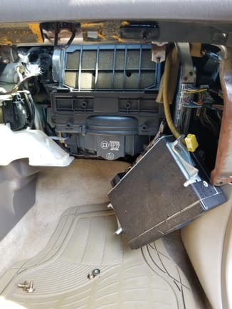 Removed glove box and cd changer in order to remove the passenger side air bag and cover. 