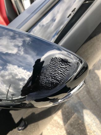 Mirror cover melted. 