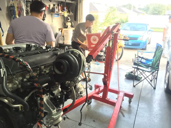 Helping out my cousin drop his 2JZ on a MK3.