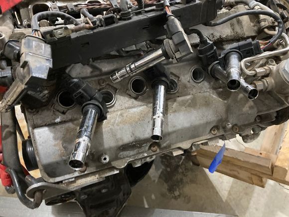 Zero oil in the wells and this is an 132k mile spare engine that I know for a fact sat in a salvage yard barn for at least 4 years before I bought it. 