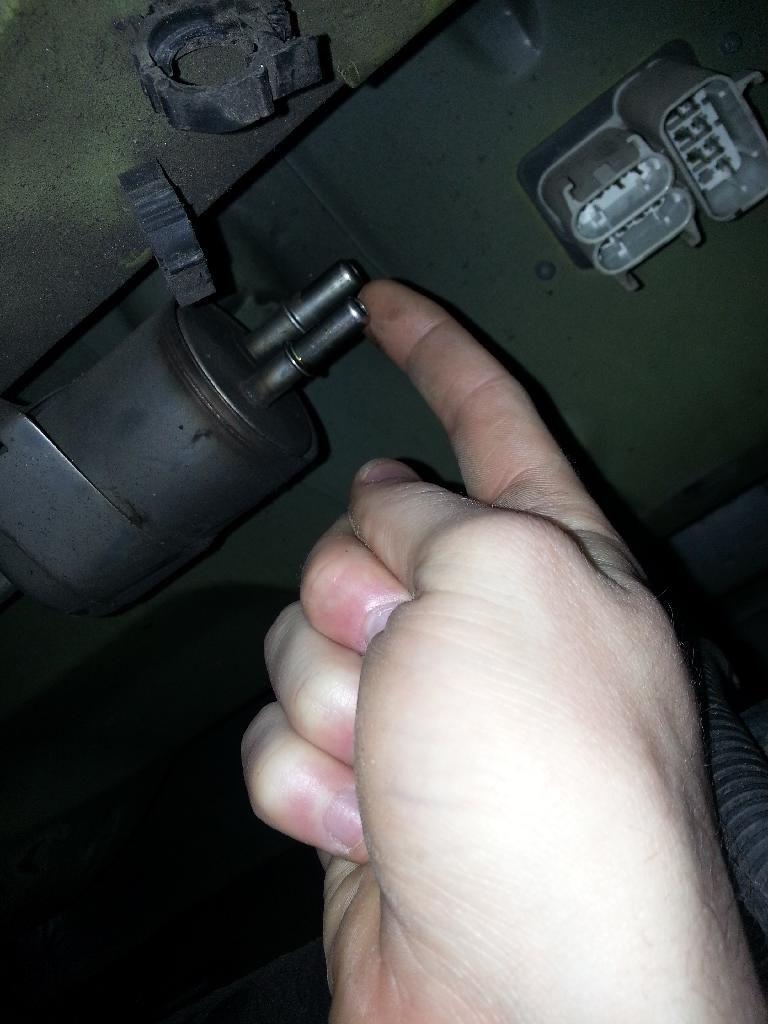 Step 3- remove the 2 fuel lines to the fuel filter and the one leaving and remove filter itself, also the clips that hold the wires to the body