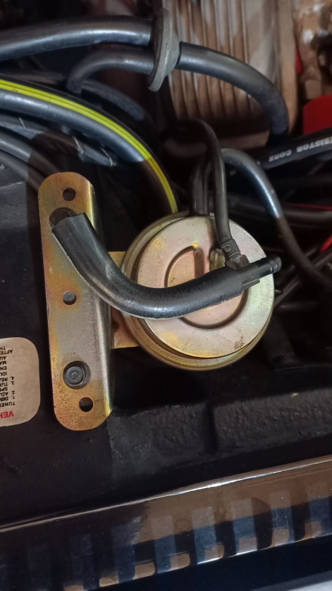 This what I found laying on the bellhousing it has a white line. the small line is the one I'm trying to identify in the next picture its goes into the cabin