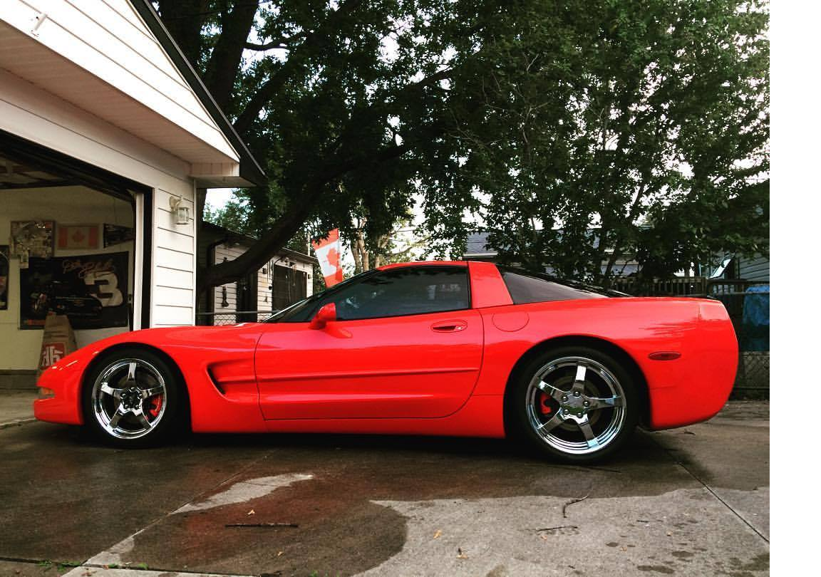 red brake calipers on a red c5 CorvetteForum Chevrolet Corvette