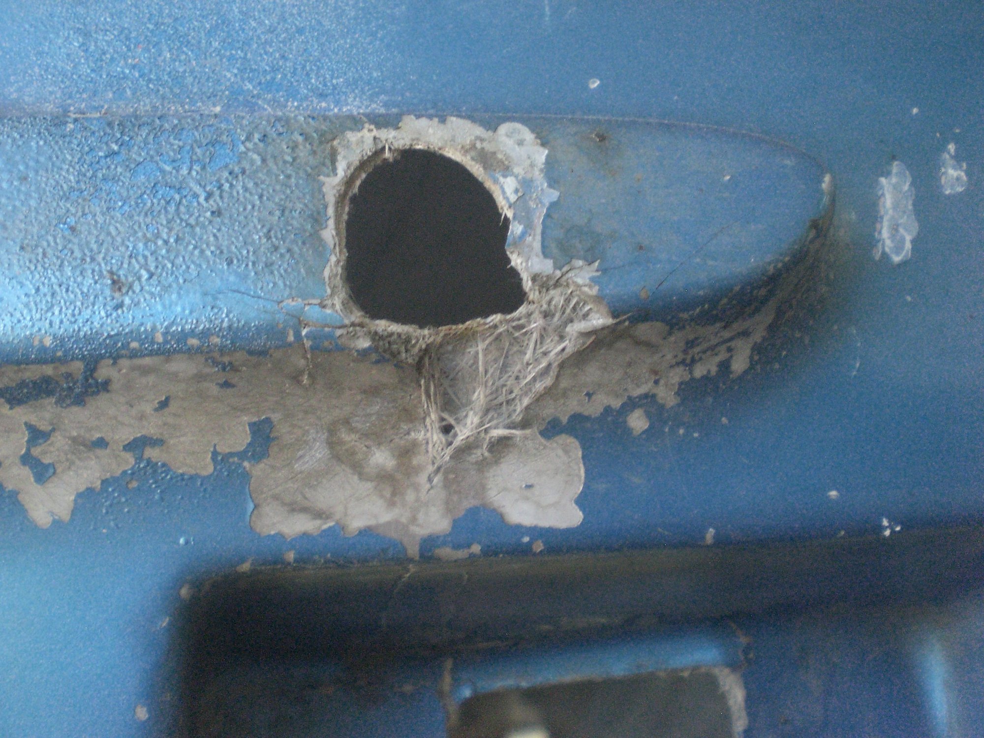 Rear bumper side mount hole
