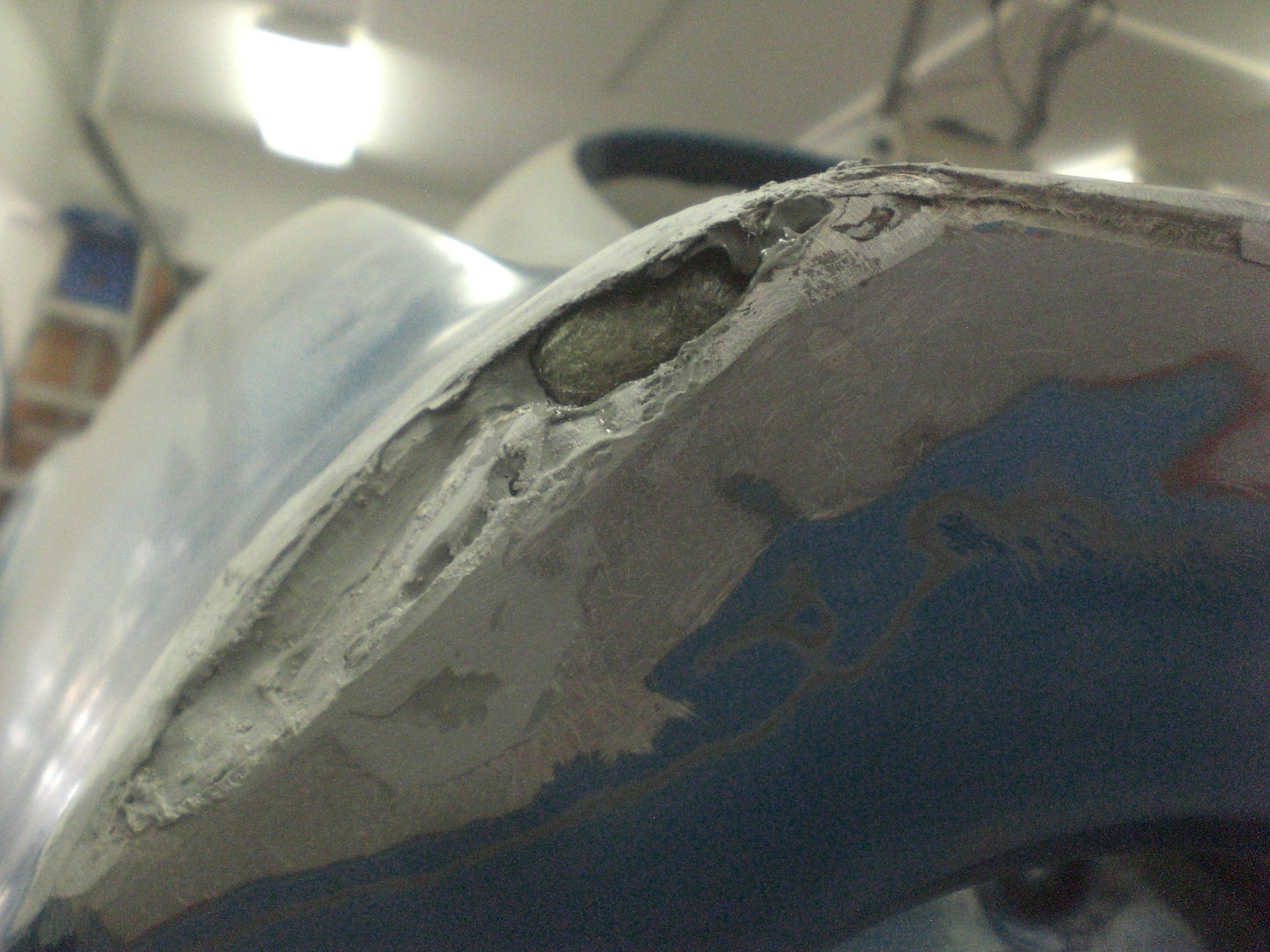 Fiberglass backing to plug the hole 