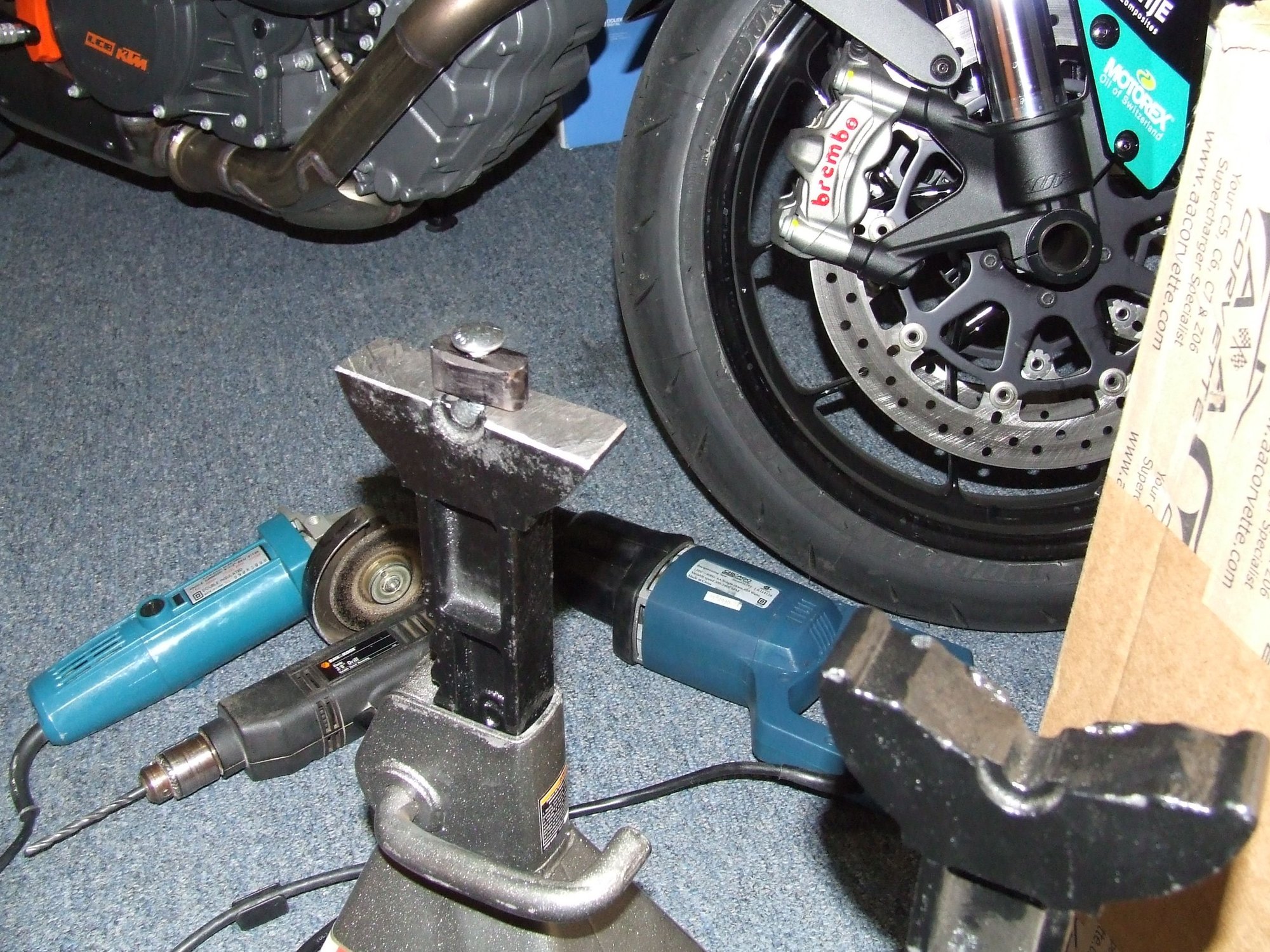 Jack stands that lock into the factory puck locations and are cheap to make@! 