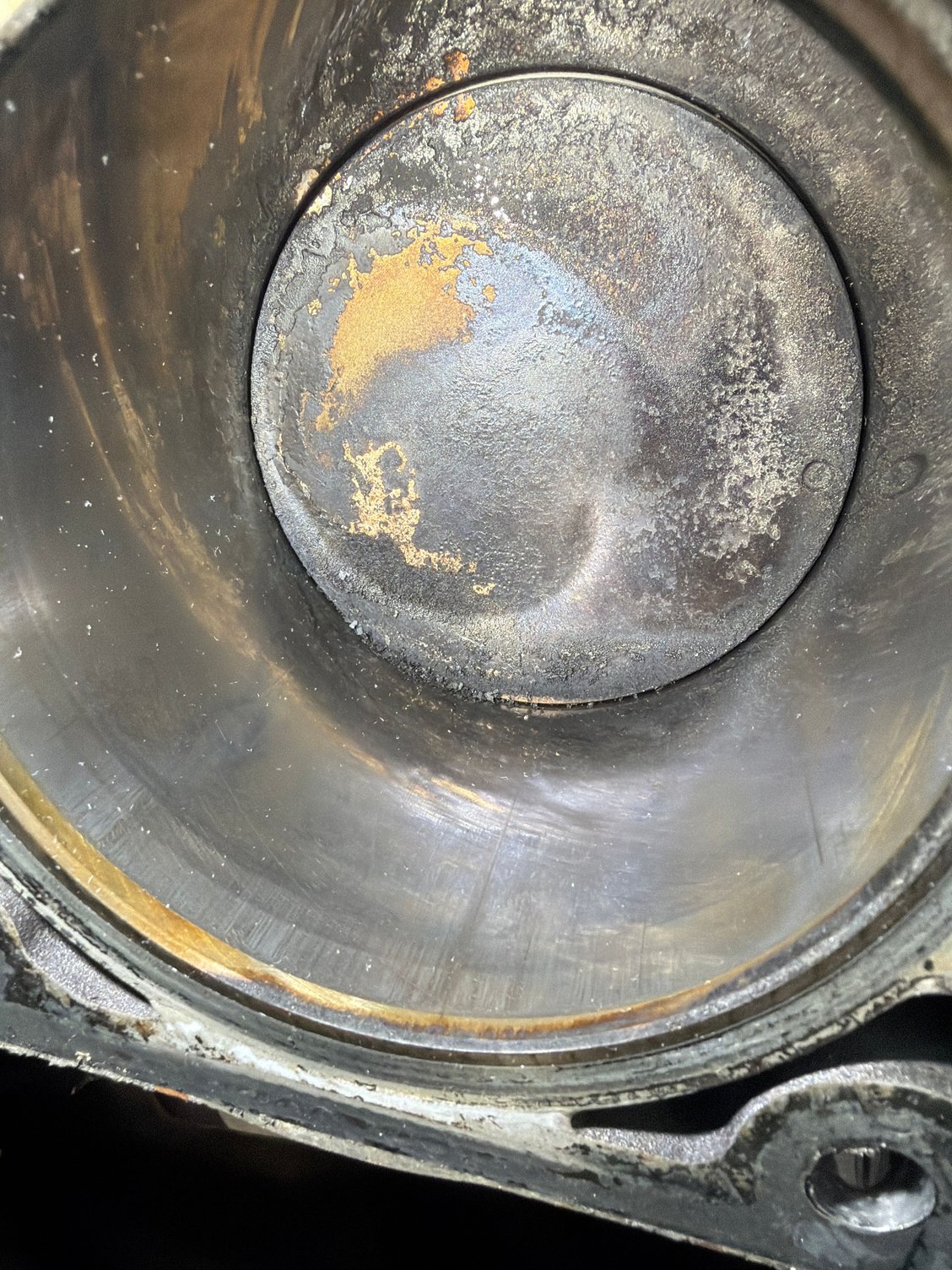 Carbon on piston and debris in cylinder