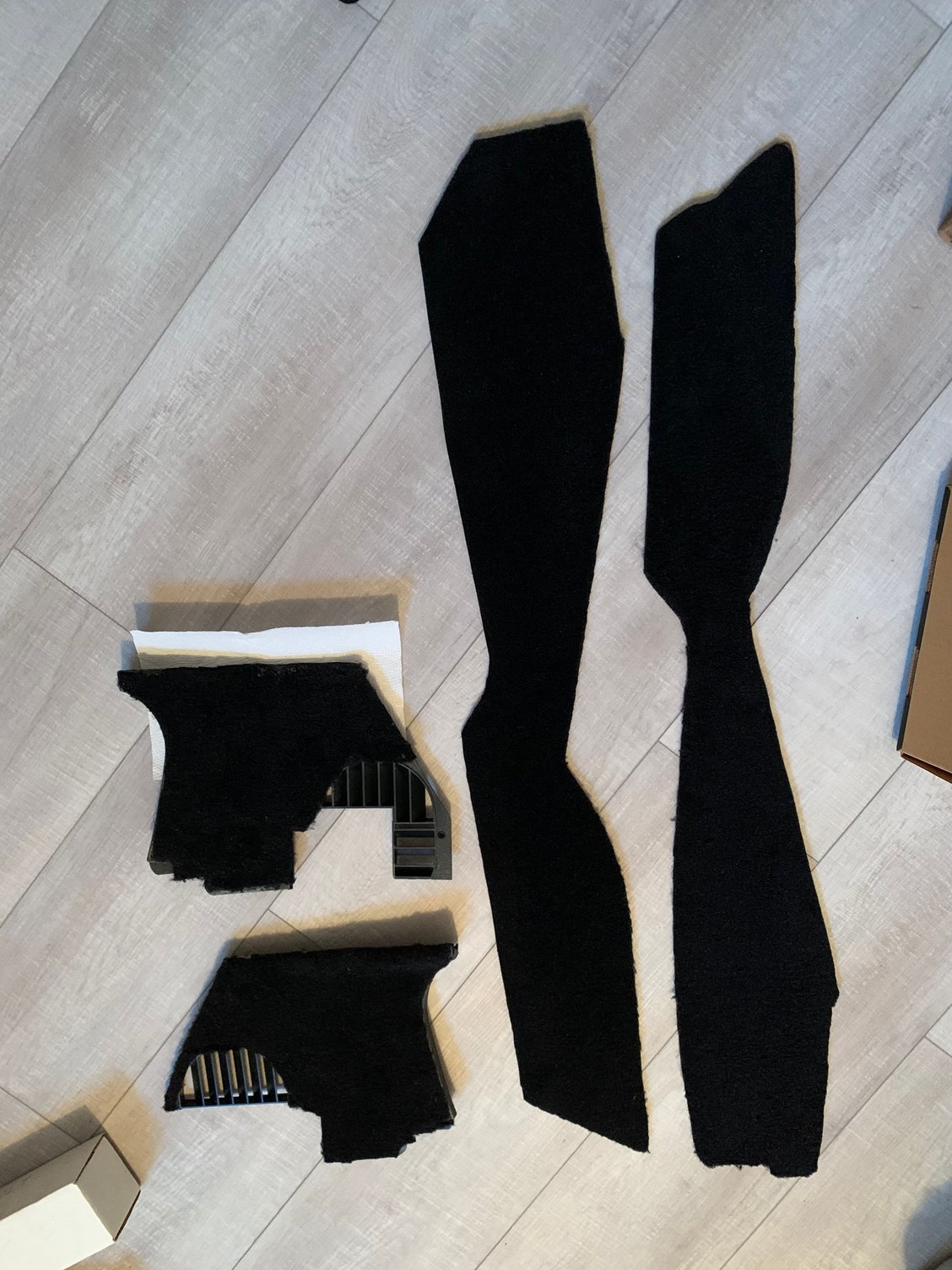 I reused the vent panels and created my own center console pieces using fiber panel wood to attach my carpet kit to. 