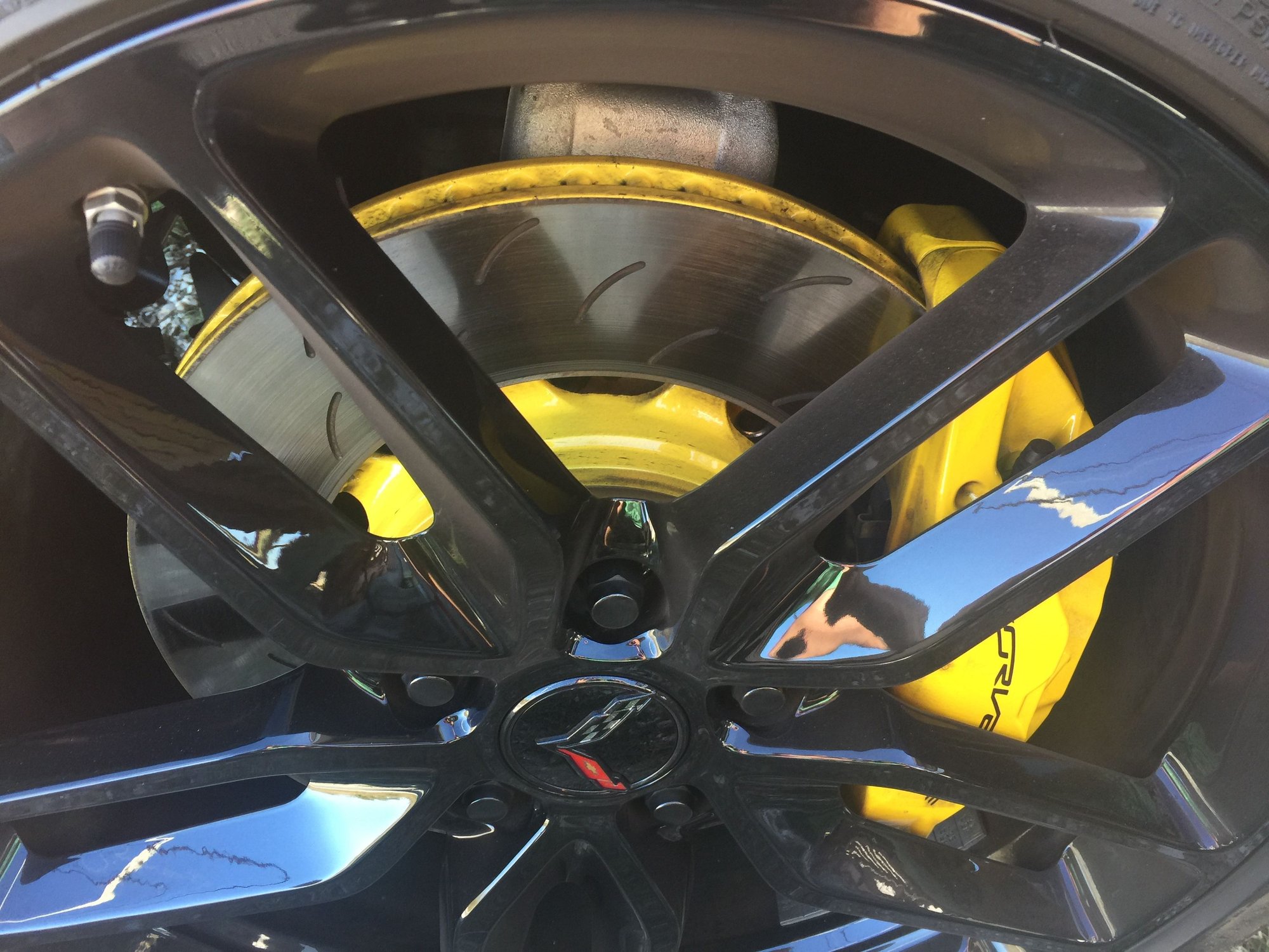 Are colored brake calipers hard to keep clean? Do all rotors rust