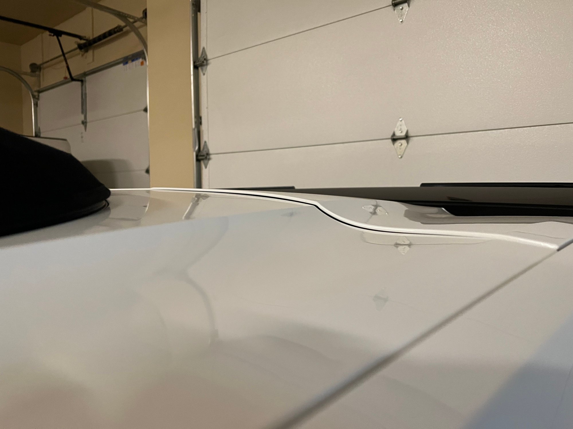 Trunk lid adjustment on convertible front edge sits too high