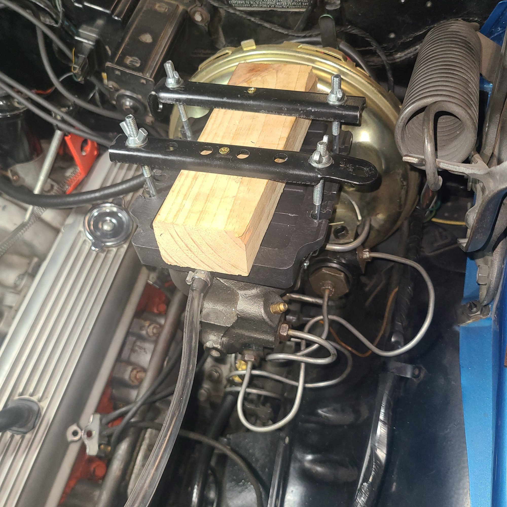 Added a block of wood and 2 pieces of scrap steel.  Chains work much better now.
