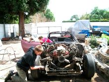 Boys and I working on the 71 Vette