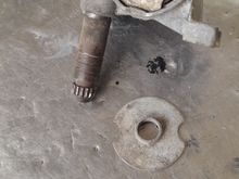 It turns out it was a vent window regulator washer from a previous repair job. This is the regulator I removed.