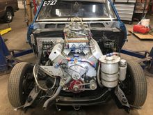 This is the race engine 
The hole in the passenger valve cover was for the vacuum pump missing in this picture, and I never ran a alternator, but will need to on the street deal 