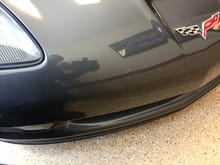 Upclose of the two/three marks on the front bumper.  This picture was sent to me from the original owner before I bought the car.