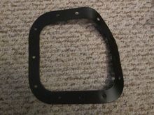This lower shift retainer brace be installed over my new rubber shift boot to keep the weather elements out of the compartment from underneath. I had it powder coated to make it as durable as possible.