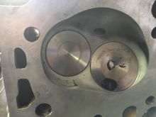 Significant chamber wall backcutting near valves